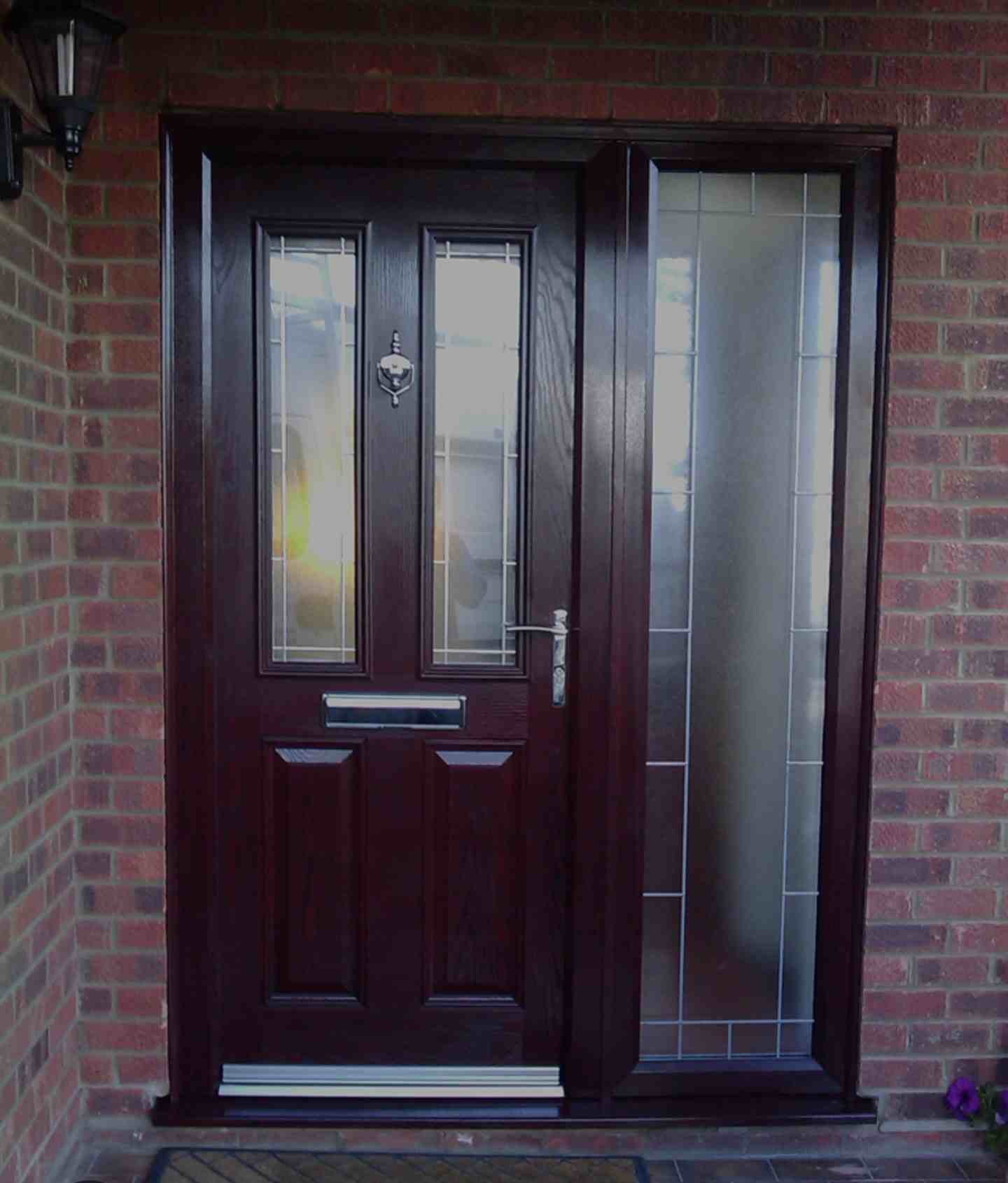 Dated dark rosewood composite door before respraying